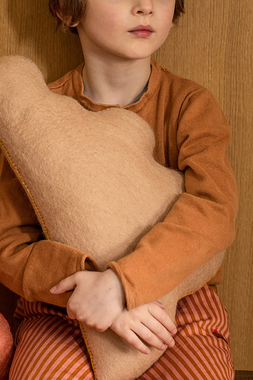 A nude cloud cushion in felted wool for poetic decor