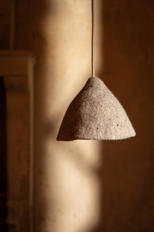 Small grey perforated felt shade for hanging light