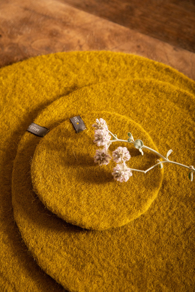 Trio of beige wool felt placemats