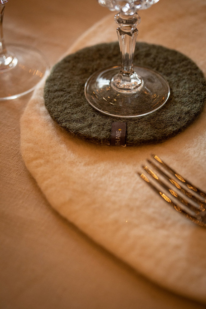 Trio of beige wool felt placemats