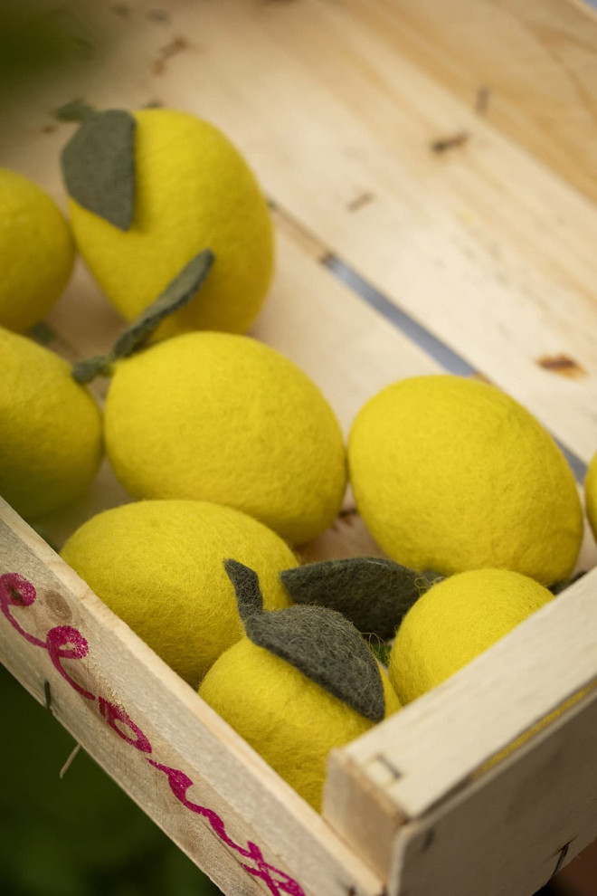 lemons handmade in felt stored in a wooden box