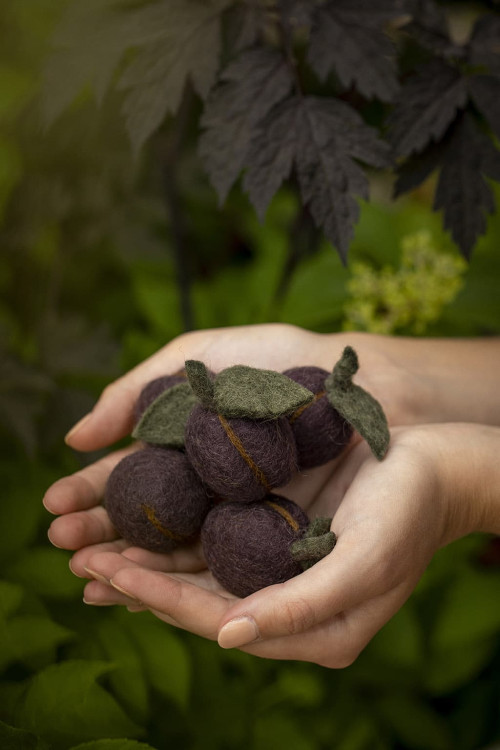 a hand full of prunes handmade in Nepal