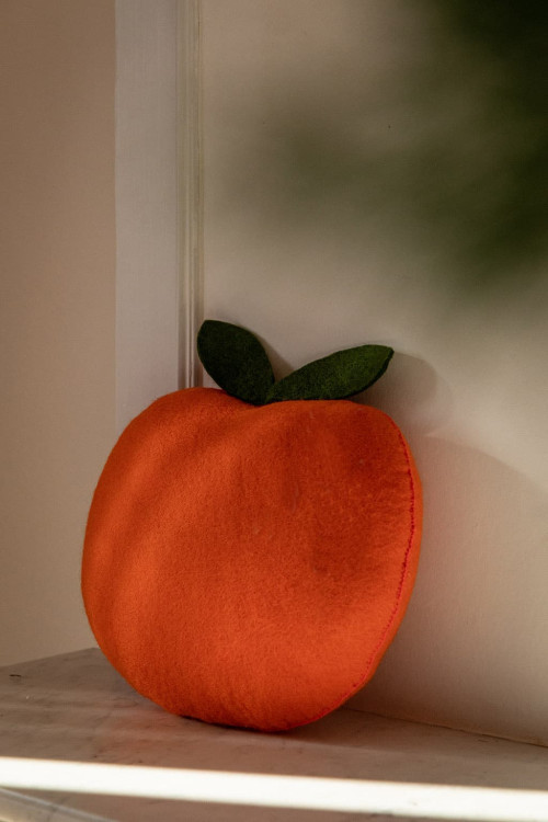 Clementine fruit cushion in felt and kapok Nepalese craftsmanship