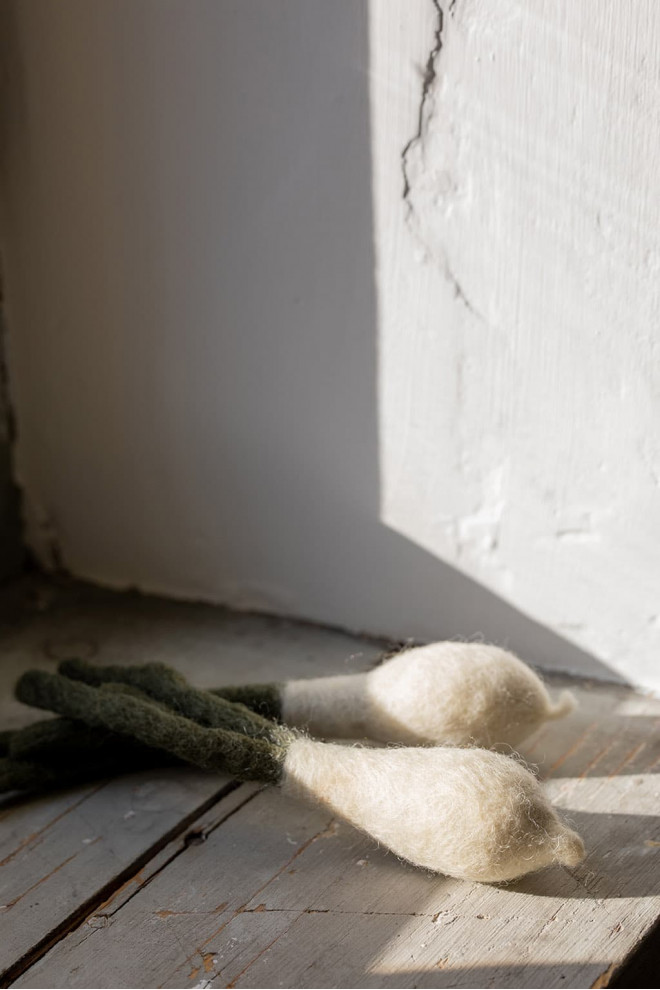 a handmade onion made of felt