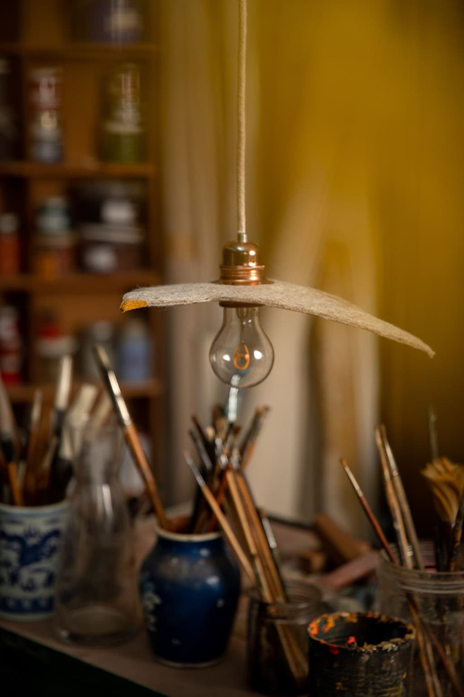 Small lighted suspension bird in quilted wool felt