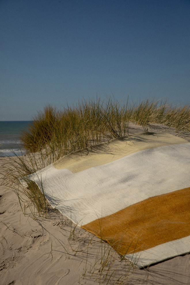 Large tricolored wool felted carpet for a modern decoration of the living room