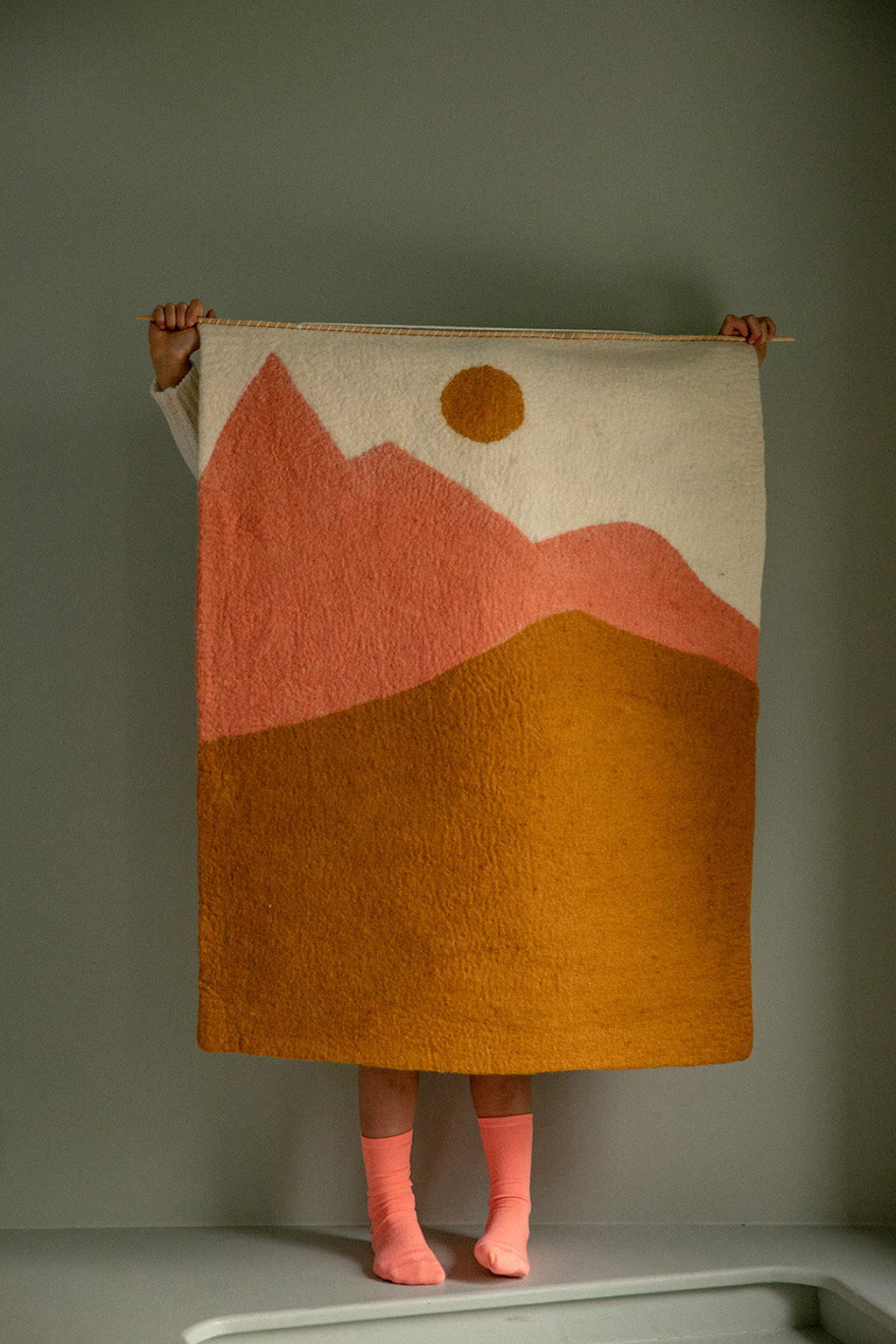 Colorful wall decoration made of felt and bamboo to decorate a wall