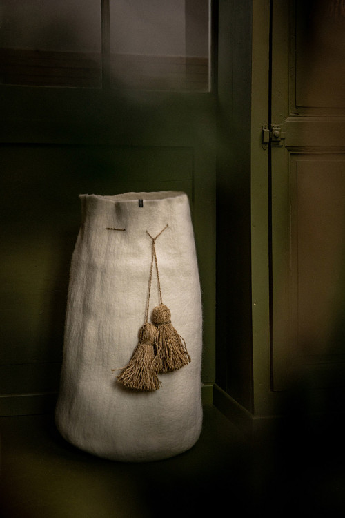 high felt basket with hemp pompons for a natural decoration