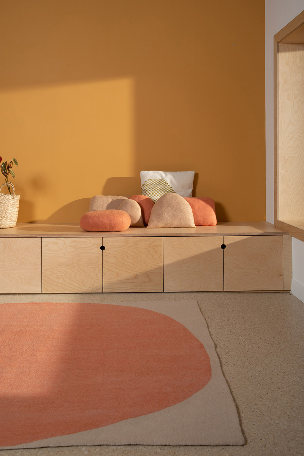 Large rectangle pink and light grey felt carpet for a contemporary living room