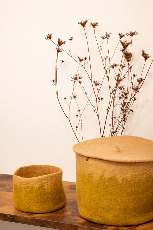 2 colors merge to create this felt storage basket