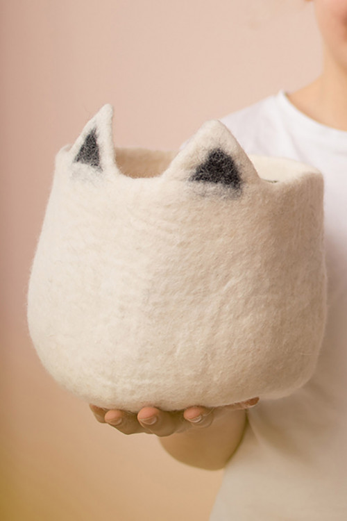 a felt basket with cat ears for a playful decoration