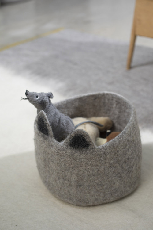 a basket with cat ears to store children's treasures