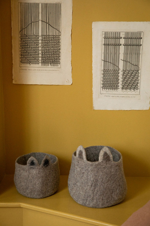 two felt baskets for children to store their toys
