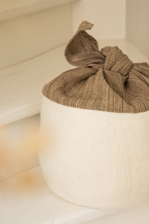 the baluchon basket used as a storage basket for an elegant decoration