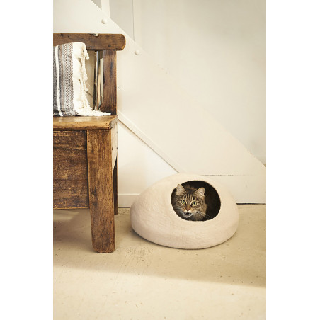 a decorative cat basket installed on a hallway floor