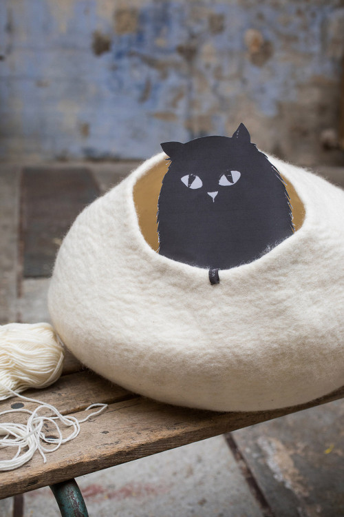 a felted wool cat basket as a decorative basket