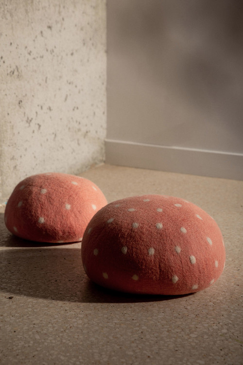 Two felted wool poufs with polka dots Two felted wool poufs with polka dots