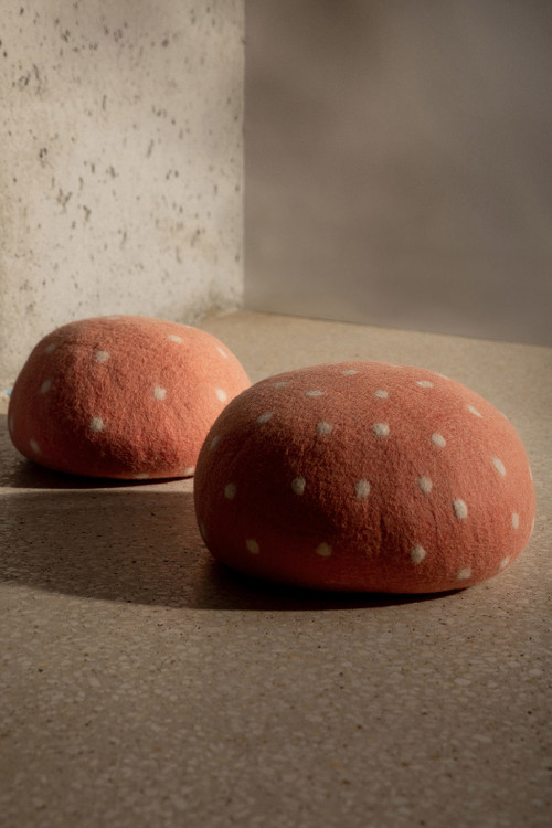 Two mushroom-shaped poufs for a playful decoration