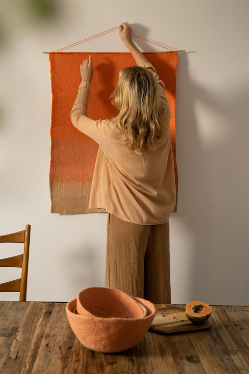 Felt and bamboo wall decoration to adorn a wall