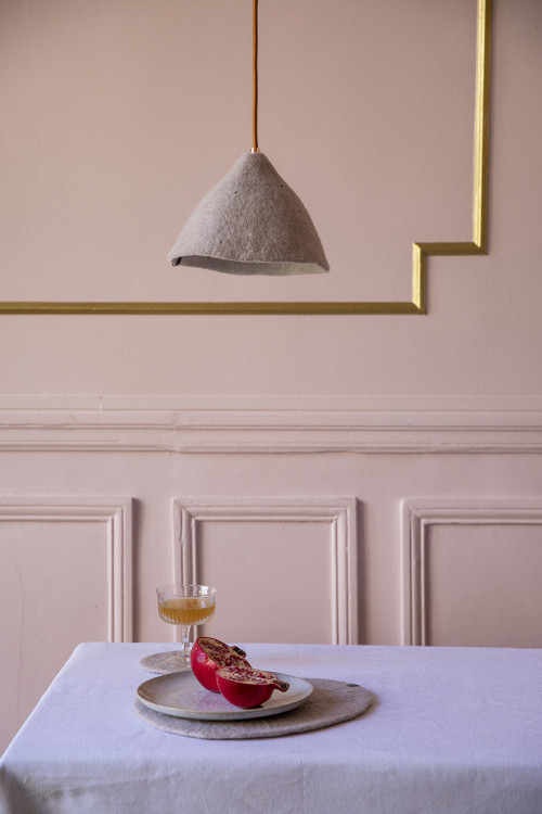 A small felt lampshade in the dining room