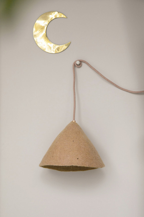 A perforated felt lampshade for a trendy hanging light