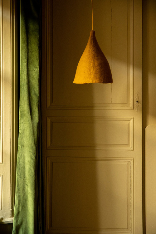 A felted wool lamp in the bedroom for a relaxing atmosphere