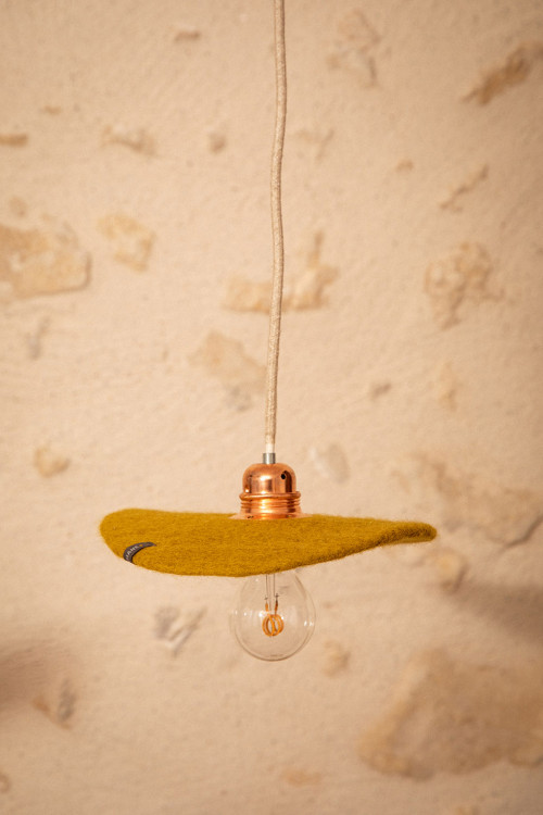 A felted wool hanging light with a vintage feel