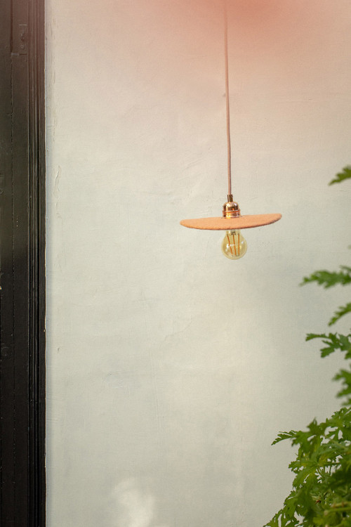 Small lighted suspension made of coloured felted wool for a cheerful touch