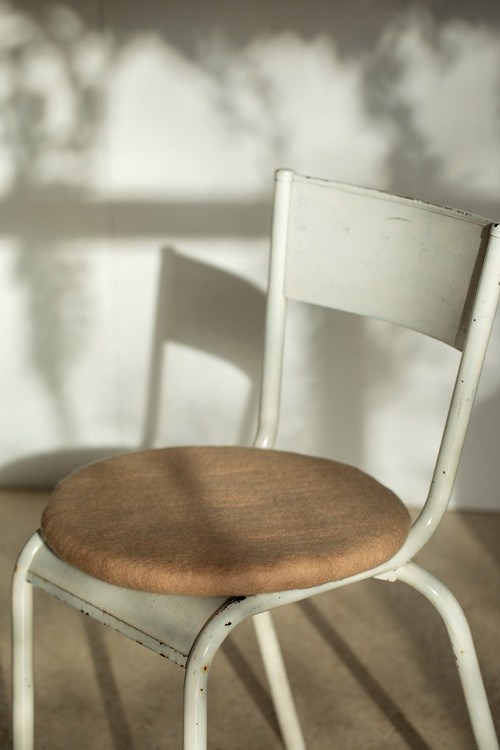 Metal chair and felt seat cushion
