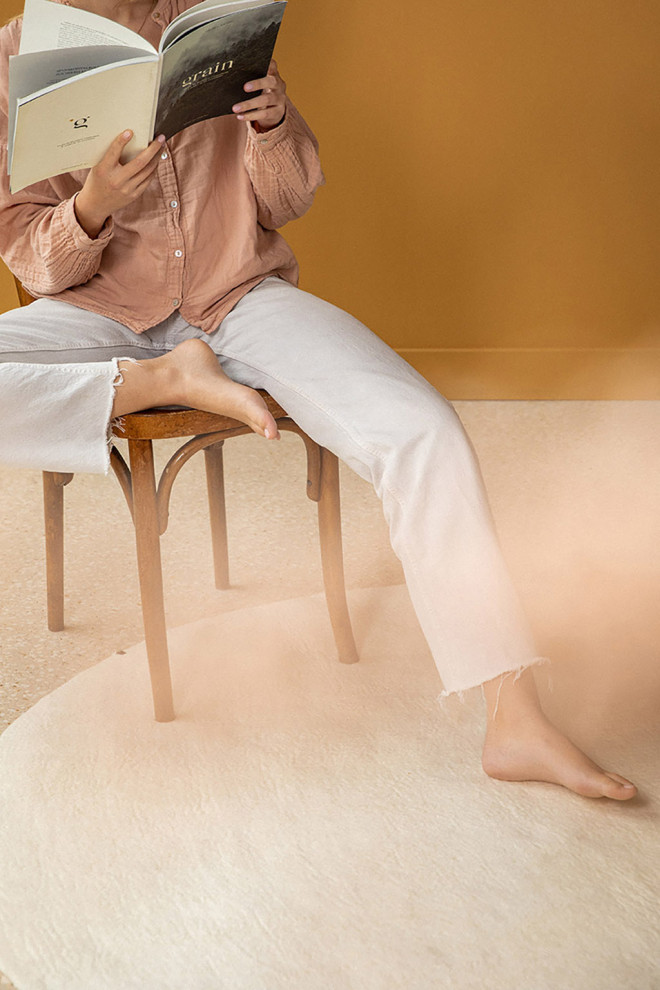 Duo of natural felt pebble rugs on the way to the bathroom
