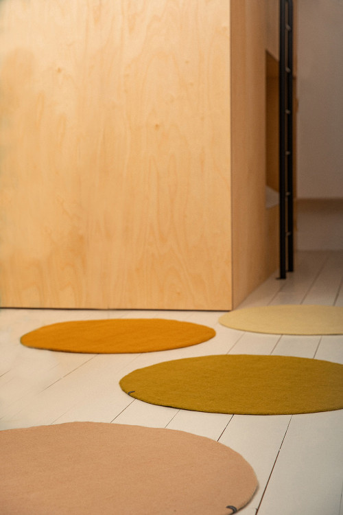 4 small round colored felted wool rugs 4 small round colored felted wool rugs