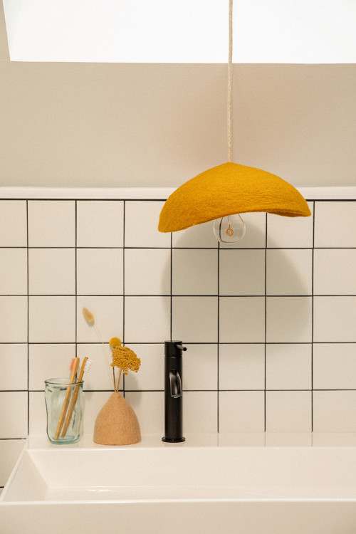 A Dome felt lampshade to illuminate the bathroom