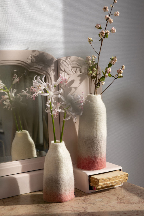 Two felt vases on a dressing table