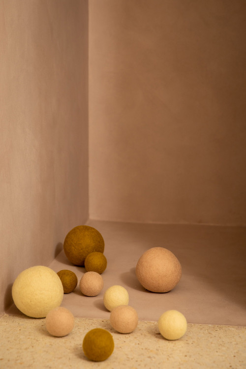 felt balls on the floor color a hallway