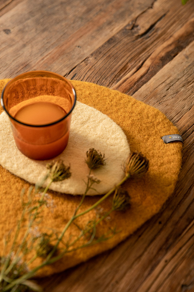 A handmade felt pebble placemat to enhance the table