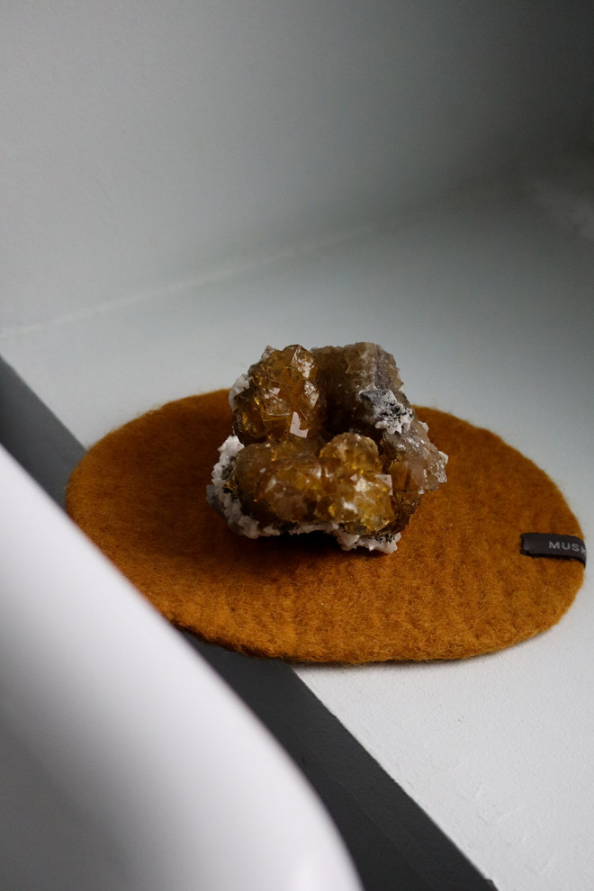 A handmade felt pebble placemat to enhance the table