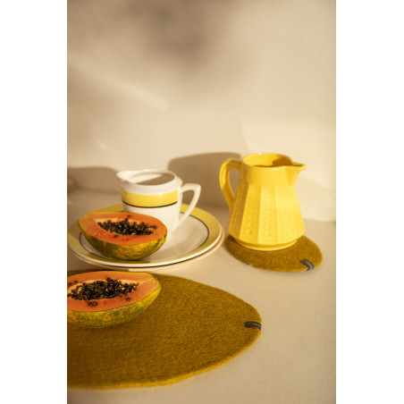 A handmade felt pebble placemat to enhance the table