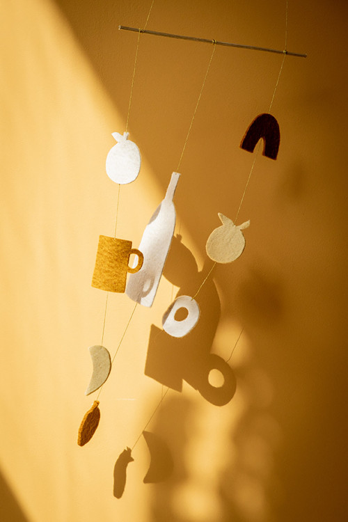Delicate bamboo mobile with felt subjects for a poetic decoration