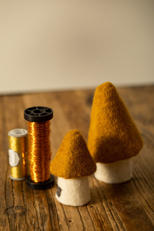 two assorted felt morels accompany haberdashery items two assorted felt morels accompany haberdashery items