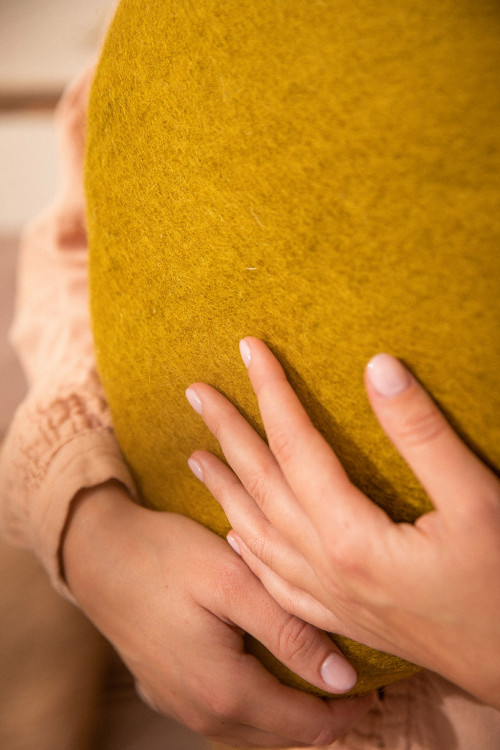A felted wool cushion for a cocooning atmosphere