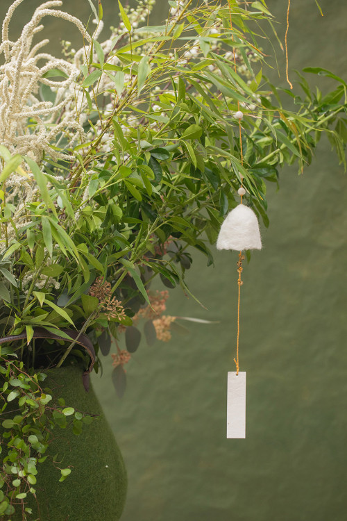 a felted wool bell hanging for a touch of natural decoration