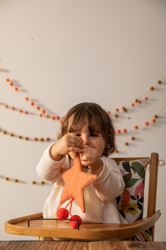 touch this soft and colorful wool star to bring color to your home