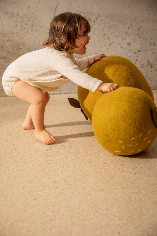 Two felted wool apple poufs to play with