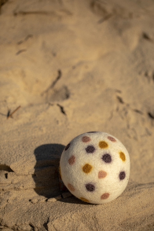 a dot ball handmade of felted wool