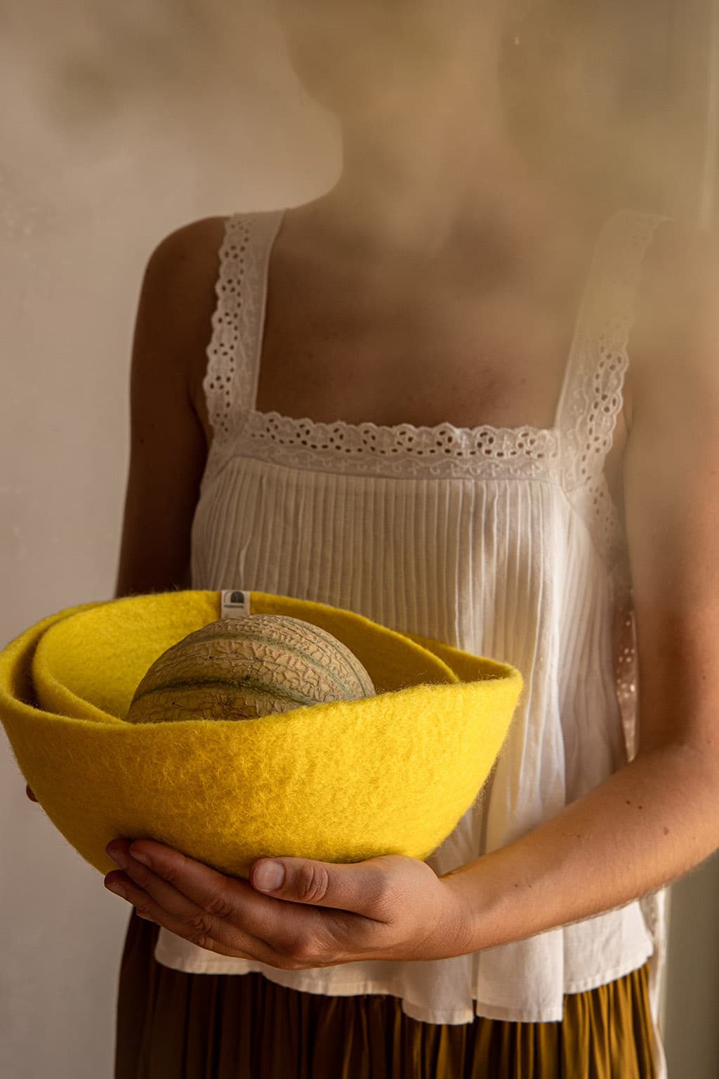 Corbeilles à fruits jaune citron en laine pour une décoration de table estivale
