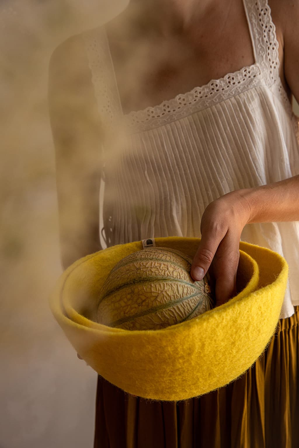 Corbeille à fruits en laine jaune
