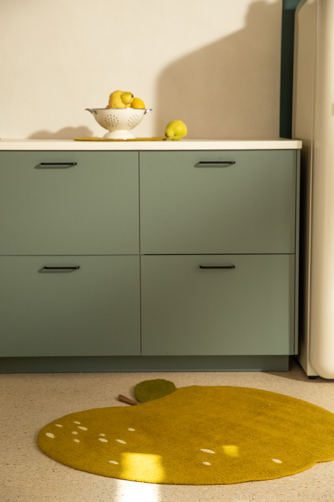 tapis pomme en feutre de laine vert pour la cuisine