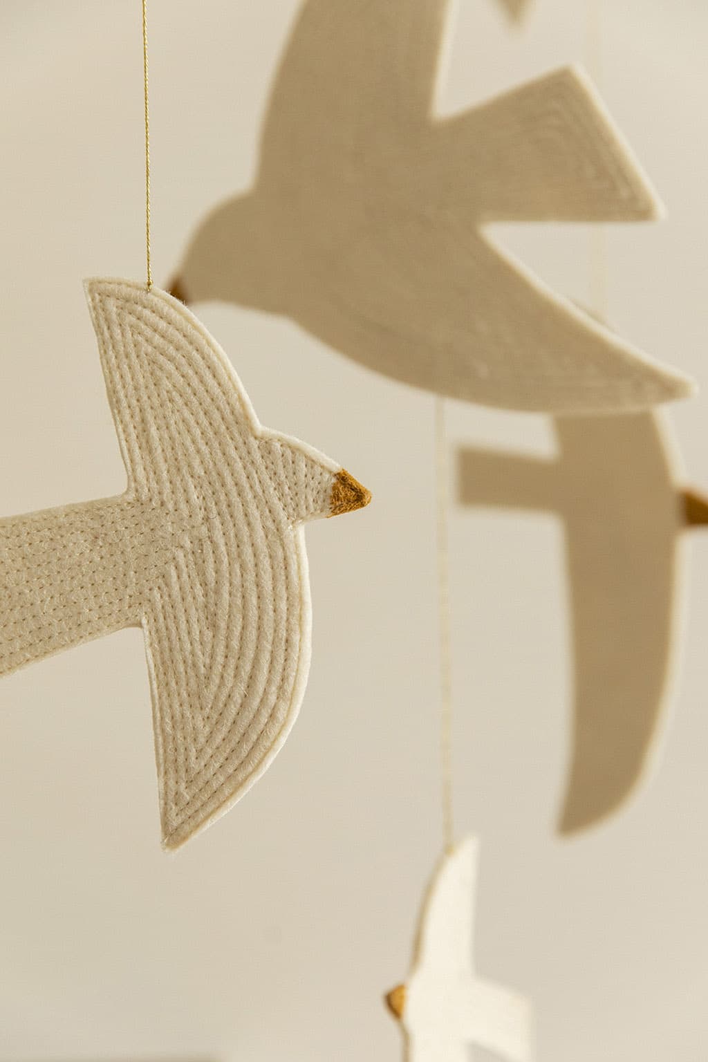 Felt and bamboo bird mobile for poetic decoration
