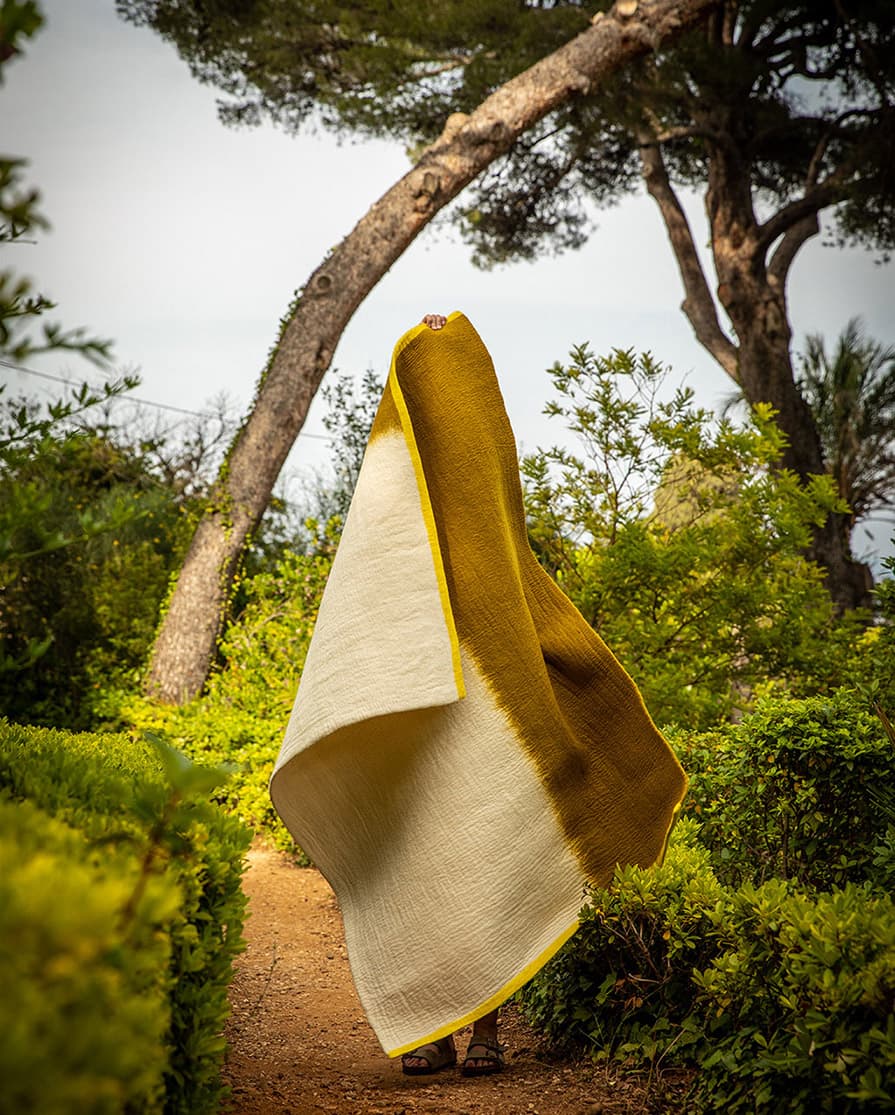 Large rectangular three-color green, white, and yellow wool felt rug for the living room