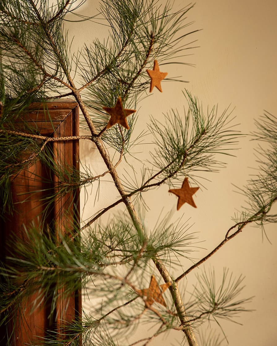 Petites étoiles de Noël en laine à suspendre pour décorer le sapin